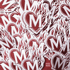 Photo de nombreux patch écussons du logo Marie Max